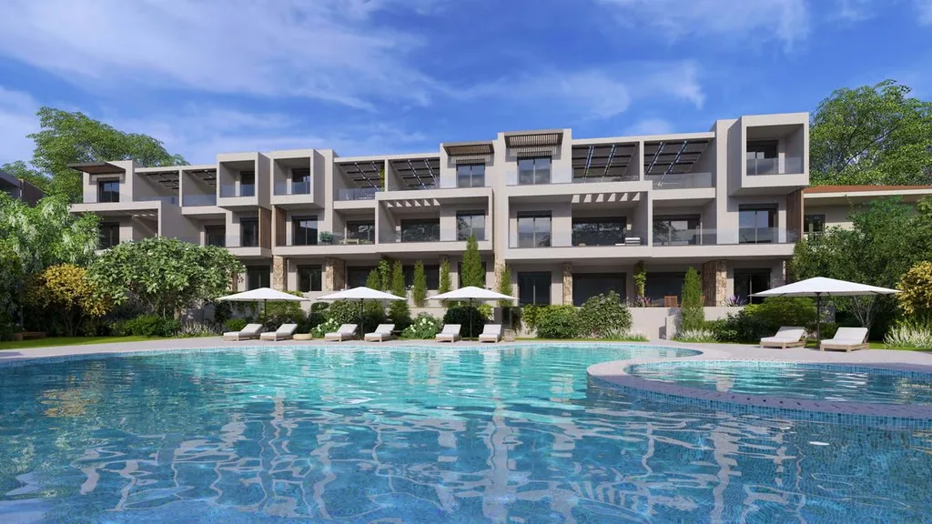 Shared pool of the Orphia complex with the building and terrace in Kallithea