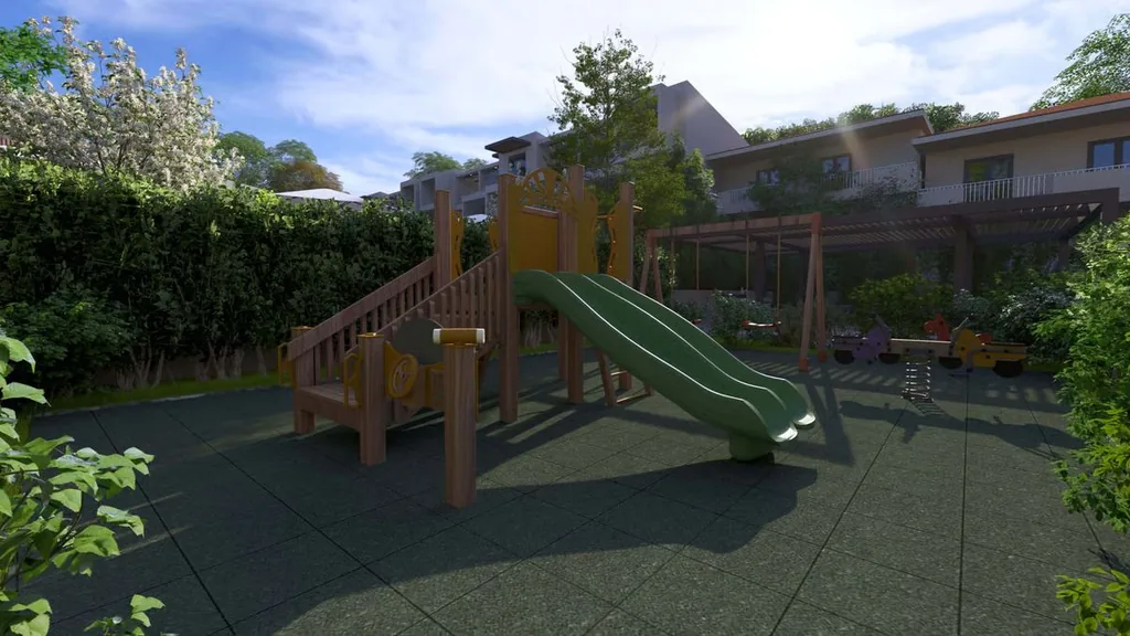 Playground at the Orphia complex with green outdoor areas for children